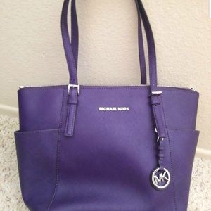 Like new Authentic purple Michael Kors purse